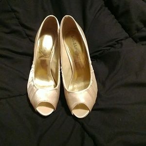 Shimmery gold peep toe heels